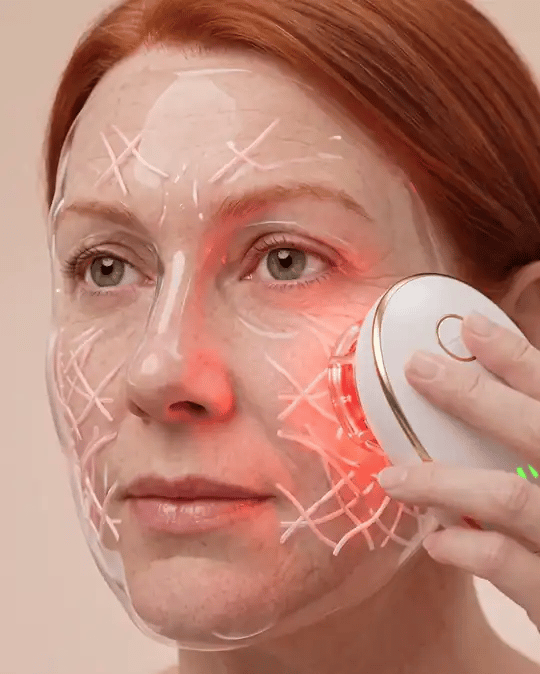 Red light rebuilding the collagen under the skin as the DepuffCup moves across the face